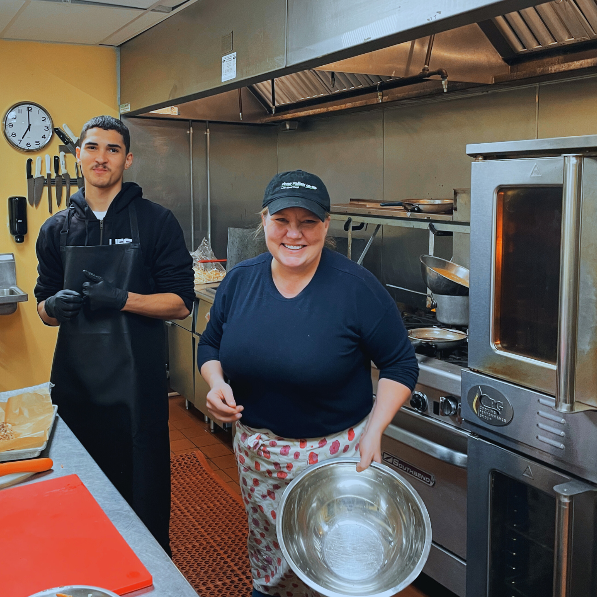 LightHouse student working in the kitchen for De la Luz